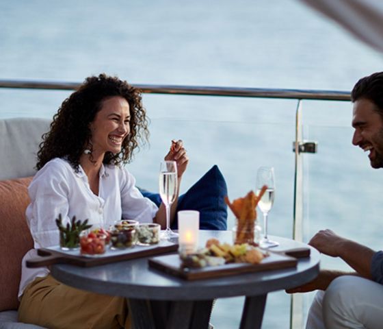 Couple having dinner in the balcony