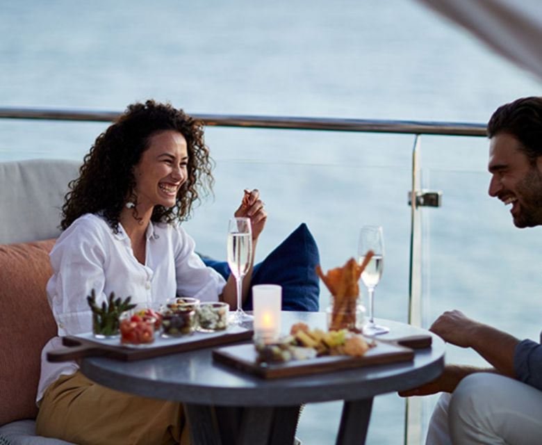 Couple having dinner in the balcony