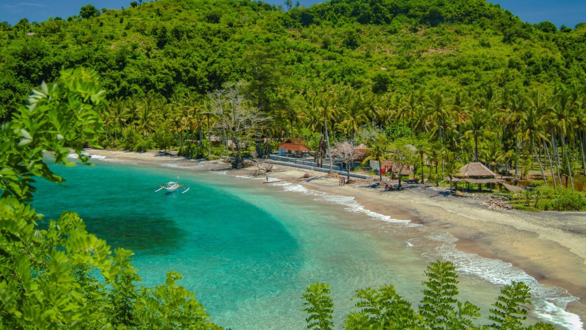 Teal coloured water at a beach in Bali - Image credit: Getty images
