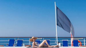 Club Med 2 Sailing - lady by the pool