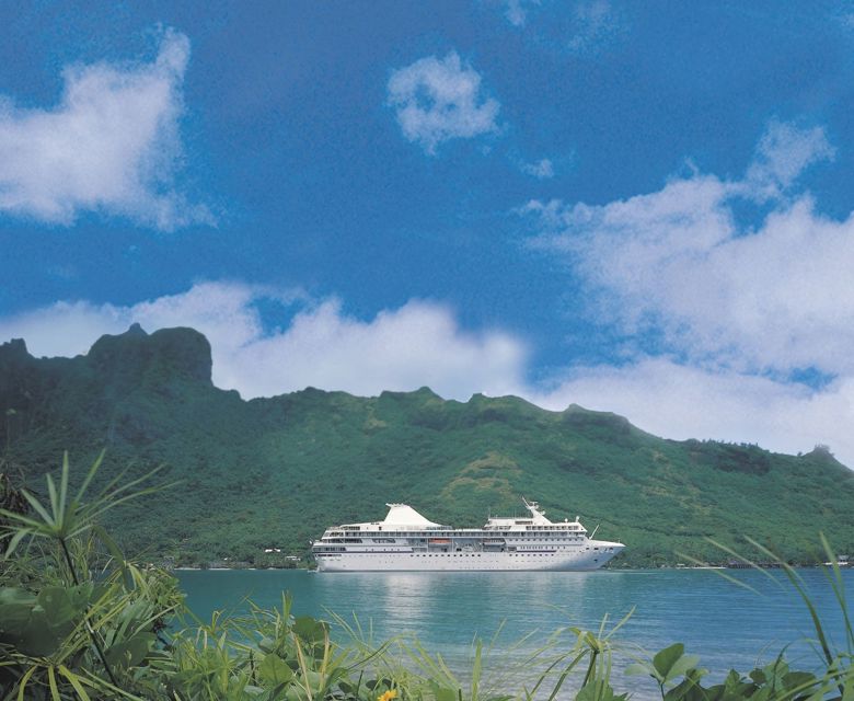 Paul Gaugin cruising the pristine beaches of Bora-Bora Island