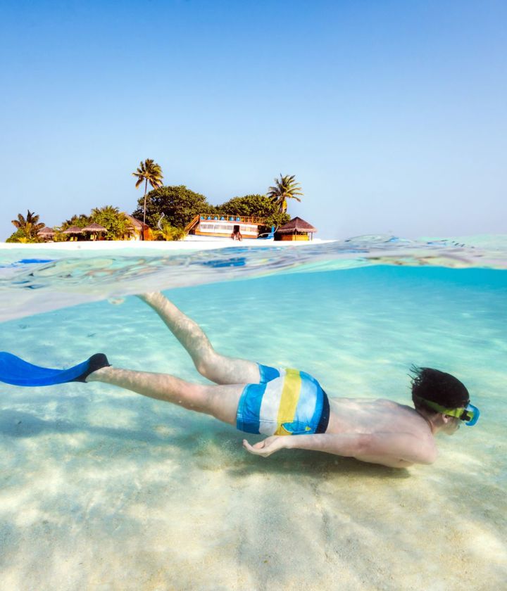 Boy snorkelling in ocean