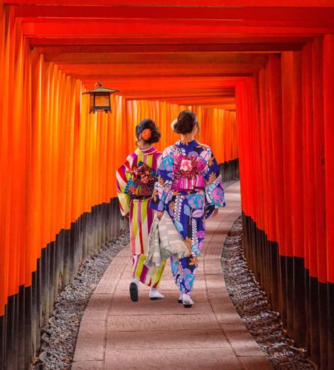 Two women walking in Japan