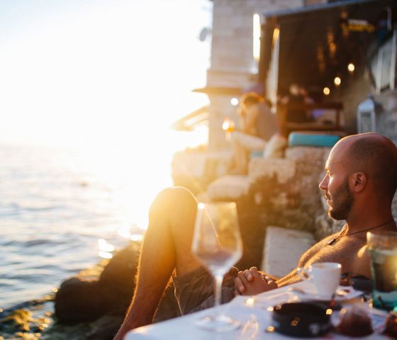 Man looking at the ocean