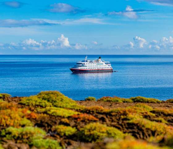 MS Santa Cruz II at the coast of San Cristóbal Island, Galápagos Island, Ecuador