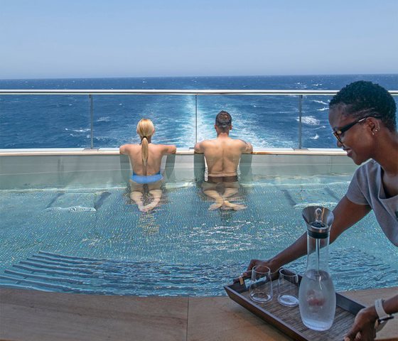 Couple in Scenic Eclipse Pool