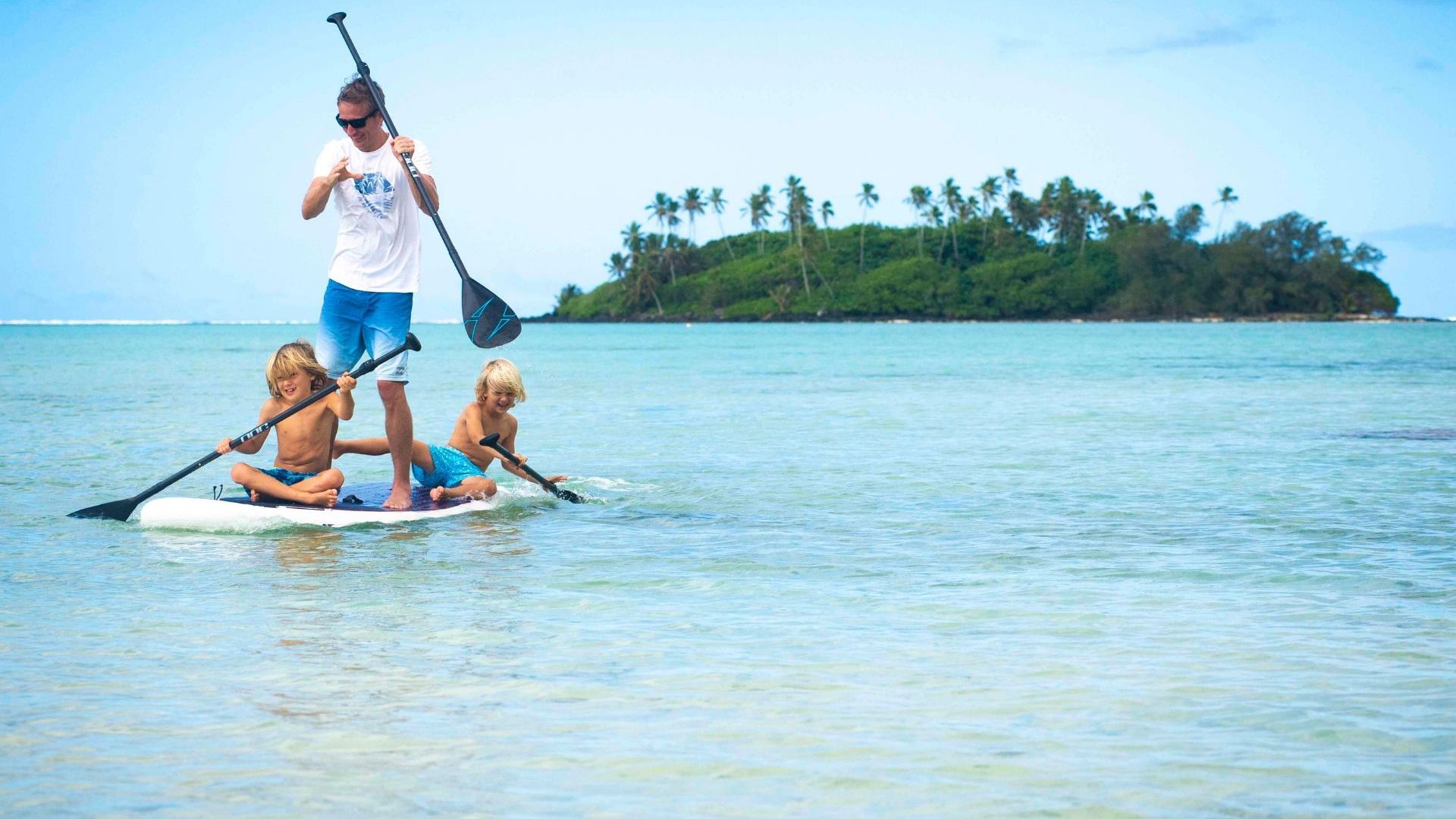 Paddle boarding on the lagoon at the Pacific Resort Rarotonga - Image credit: David Kirkland Photography