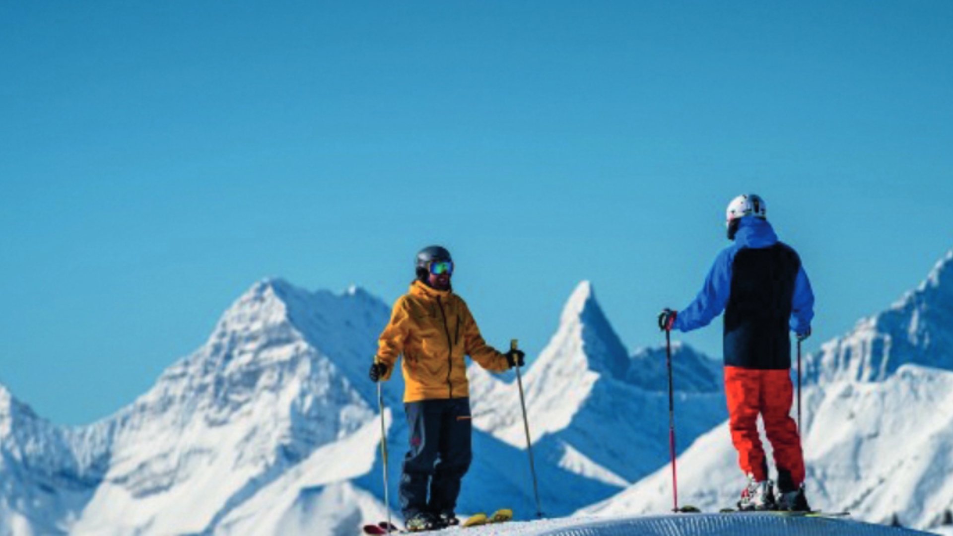 Skiers standing on top of a mountain - Image credit: Reuben Krabbe