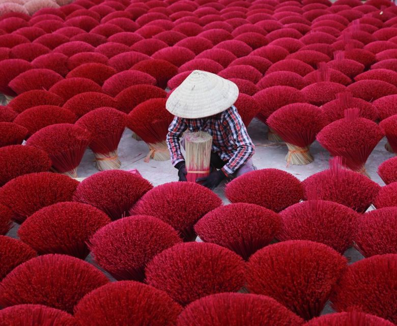 Asia Vietnam Woman Making Red Incense 