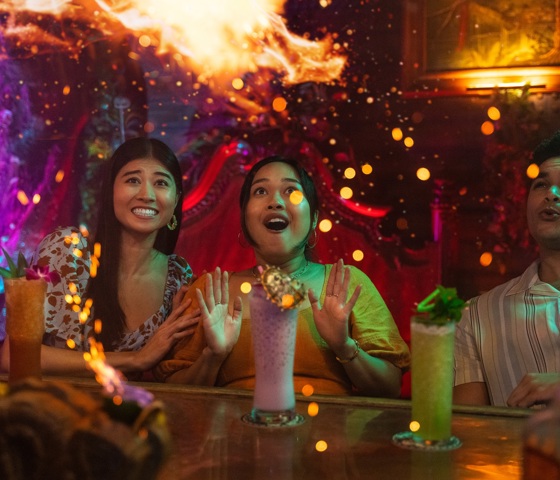 Three people having a drink
