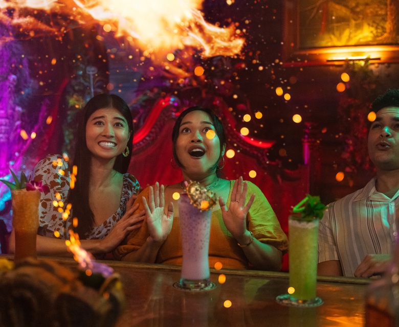 Three people having a drink