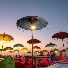 Beach umbrellas at sunset