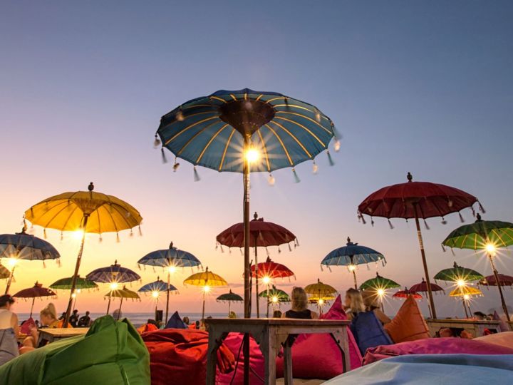 Beach umbrellas at sunset