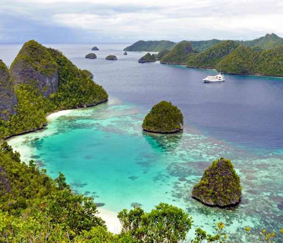 Coral Expeditions Raja Ampat Looking Out Over Wayag Lagoon From Mount Pindito